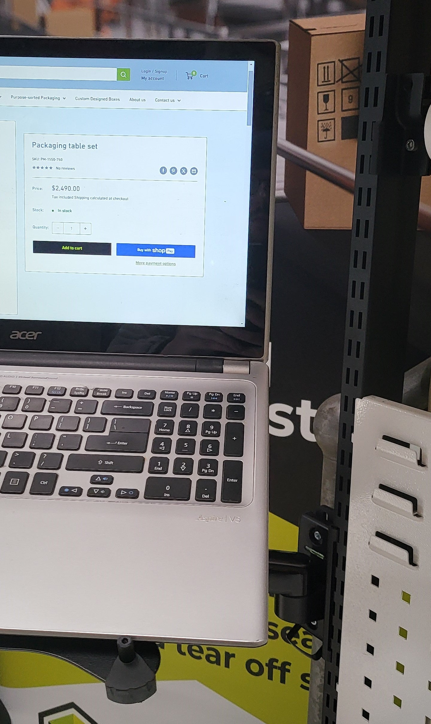 Laptop rack for the packing table packaging table